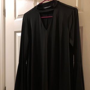 Black bell sleeve top